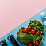 egetable salad in heart-shaped bowl, water,