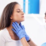 An illustration showing a human figure with highlighted thyroid glands, symbolizing the importance of thyroid health and awareness in overall well-being.